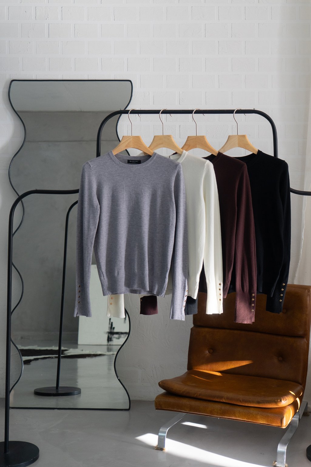 Sweater botón manga